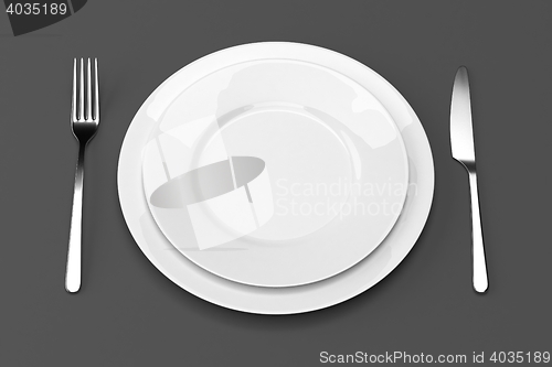 Image of Fork and knife with plates