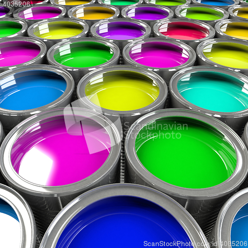 Image of Multiple open paint cans.