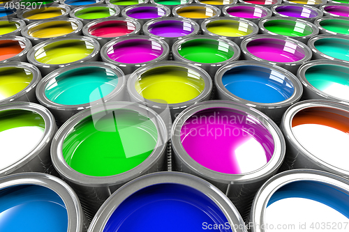 Image of Multiple open paint cans.