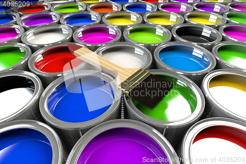 Image of Multiple open paint cans with a brush. 