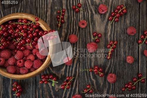 Image of Fresh berries on wooden table