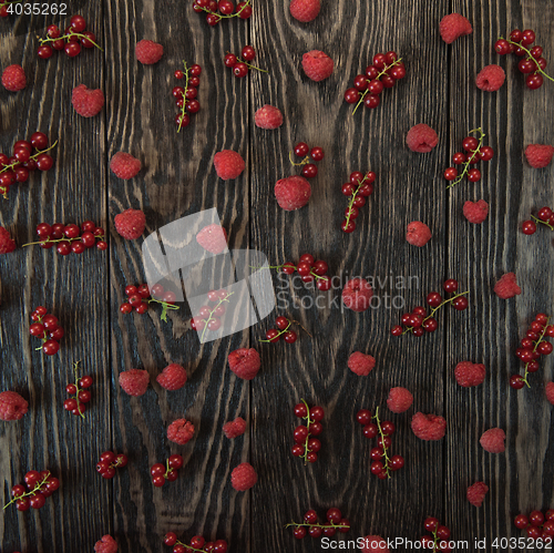 Image of Fresh berries on wooden table