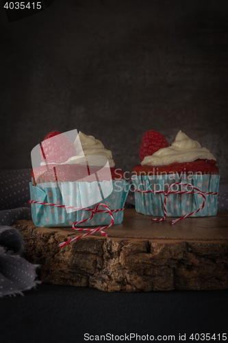 Image of Red cupcakes with cream cheese frosting