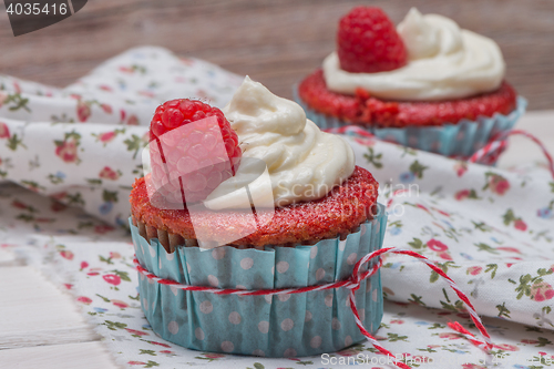 Image of Red cupcakes with cream cheese frosting