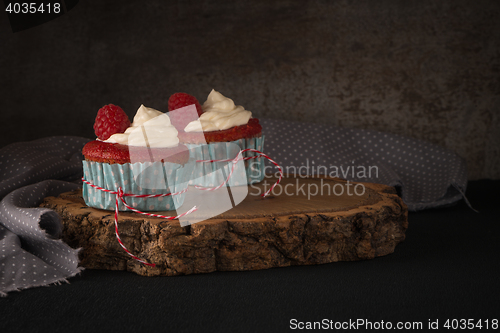 Image of Red cupcakes with cream cheese frosting