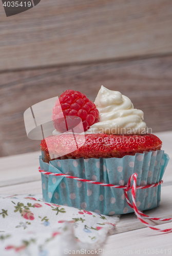 Image of Red cupcakes with cream cheese frosting