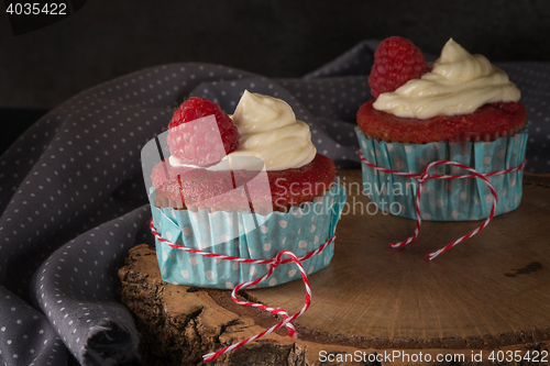 Image of Red cupcakes with cream cheese frosting