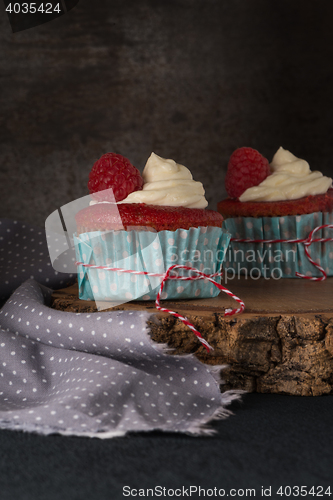 Image of Red cupcakes with cream cheese frosting