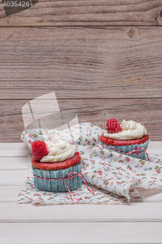 Image of Red cupcakes with cream cheese frosting