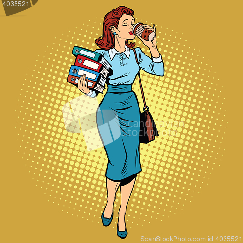 Image of Business woman drinking coffee on the go