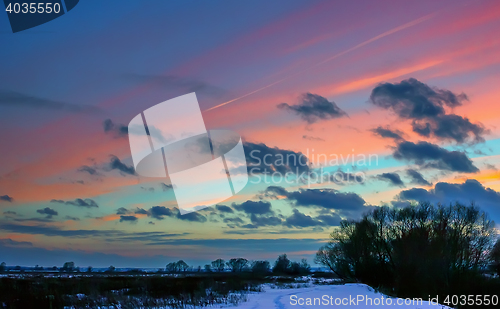 Image of Winter Landscape With Pink Clouds At Sunset