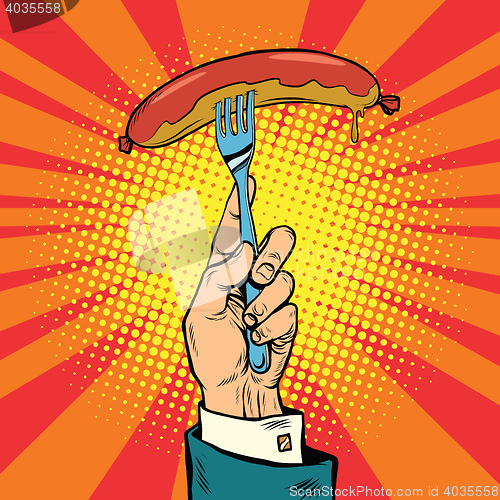 Image of Sausage on a fork, street food