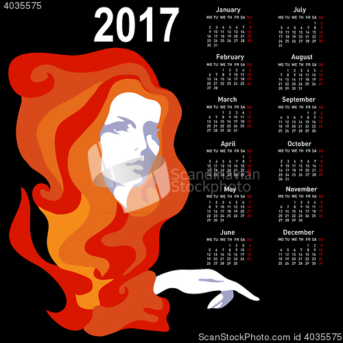 Image of Stylish calendar with woman for 2017. Week starts on Monday