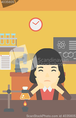 Image of Female student working at laboratory class.
