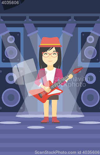 Image of Musician playing electric guitar.