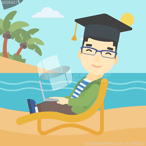 Image of Graduate lying in chaise lounge with laptop.