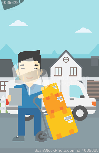 Image of Delivery man with cardboard boxes.