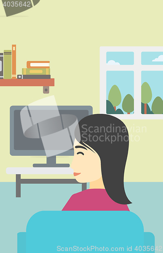 Image of Woman watching TV.