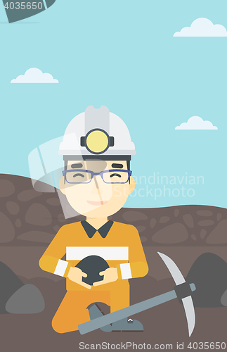 Image of Miner holding coal in hands vector illustration.