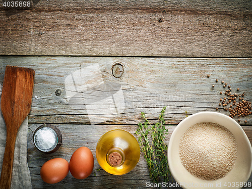 Image of cooking ingredients on wooden table