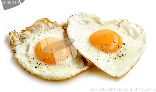 Image of fried eggs on white background