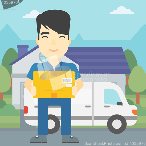 Image of Delivery man carrying cardboard boxes.