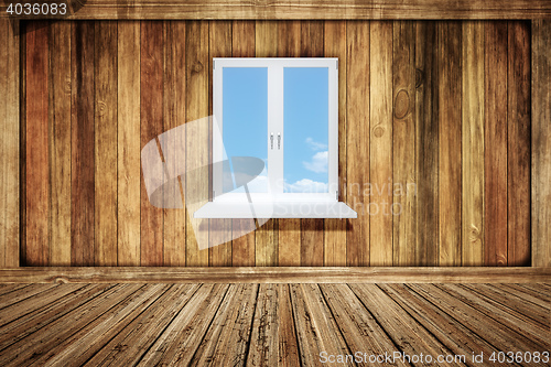 Image of empty wooden room with a window