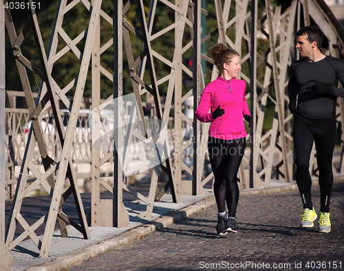 Image of young  couple jogging