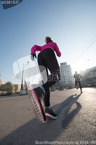 Image of young  couple jogging