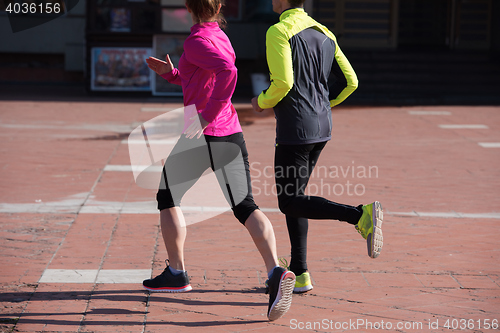 Image of young  couple jogging