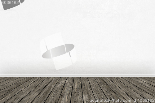 Image of empty room with a wooden floor