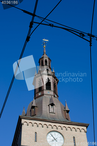 Image of Oslo Cathedral framed with powerlines for the tram