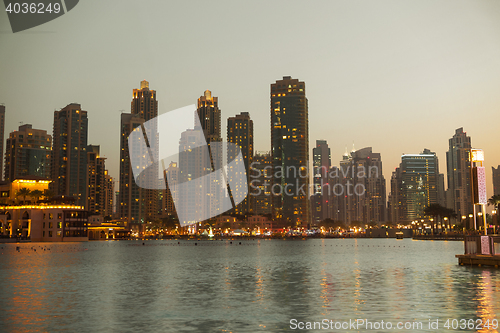 Image of Dubai city business district and seafront at night