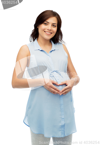 Image of happy pregnant woman making heart gesture on belly