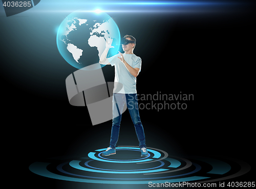 Image of happy man in virtual reality headset or 3d glasses