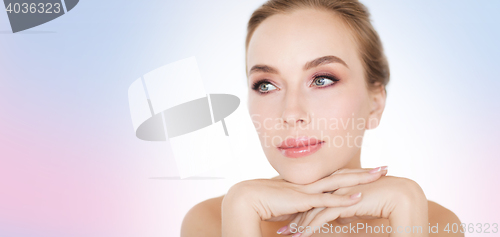 Image of beautiful young woman face and hands