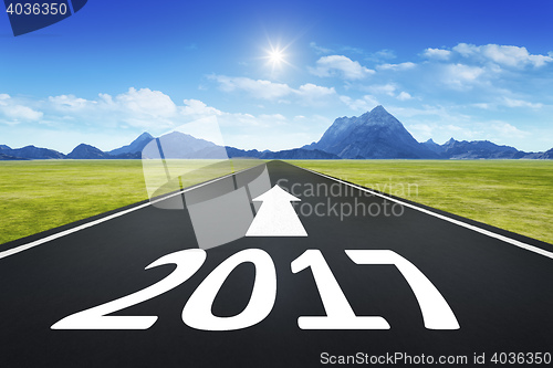Image of road to horizon with the number 2017