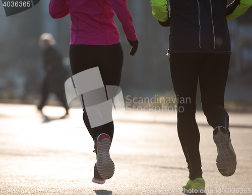 Image of young  couple jogging