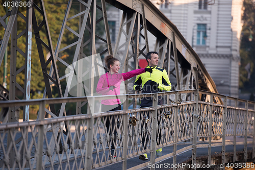 Image of young  couple jogging