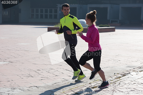 Image of young  couple jogging