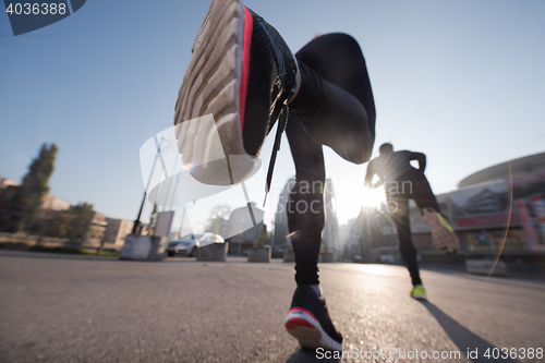 Image of young  couple jogging