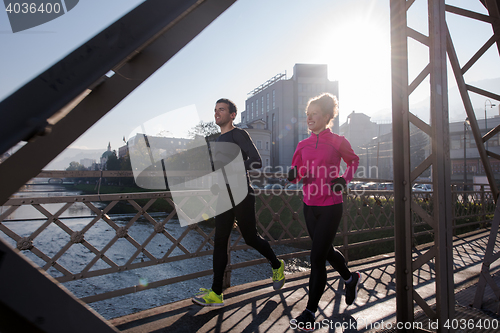 Image of young  couple jogging