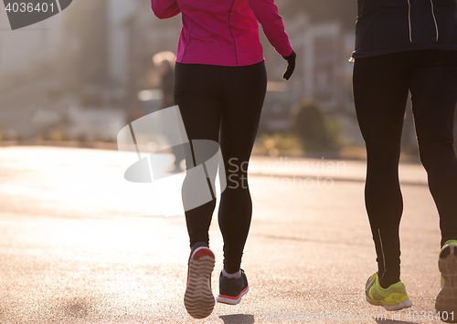 Image of young  couple jogging