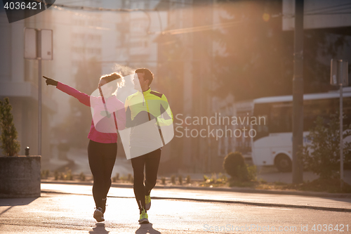 Image of young  couple jogging