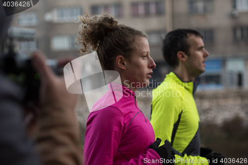 Image of young  couple jogging