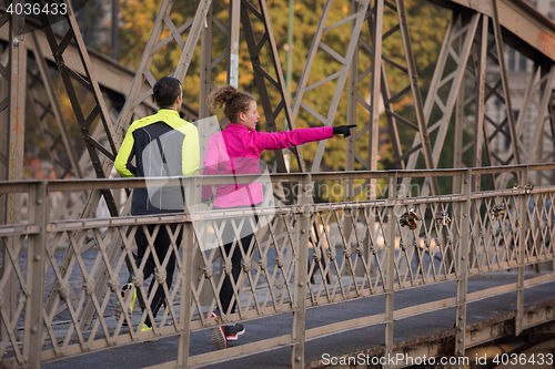 Image of young  couple jogging