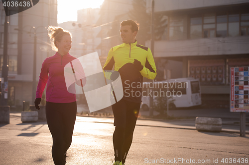 Image of young  couple jogging