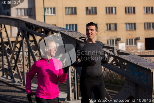 Image of young  couple jogging