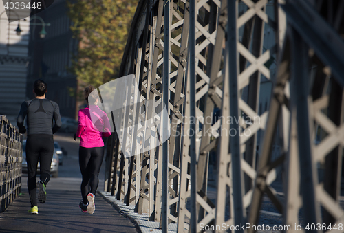 Image of young  couple jogging