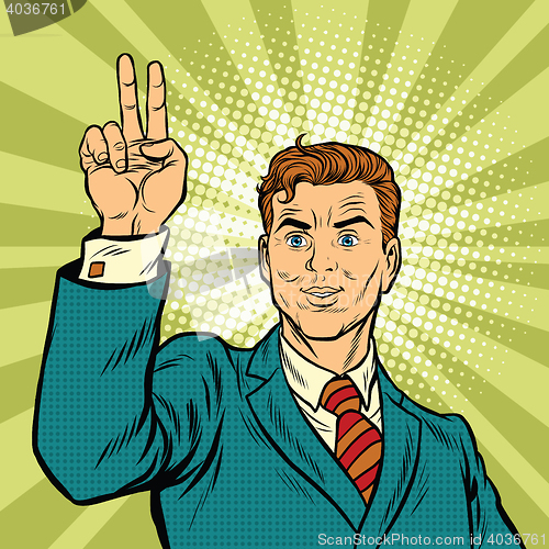 Image of Male fingers of a hand shows the number two, victory